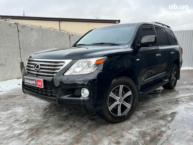 Черный Лексус LX 570, объемом двигателя 57 л и пробегом 153 тыс. км за 25490 $, фото 2 на Automoto.ua