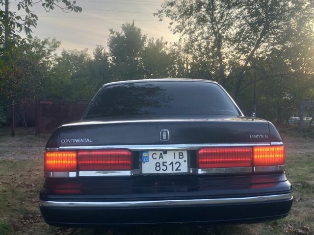 Чорний Лінкольн Континенталь, об'ємом двигуна 3 л та пробігом 2 тис. км за 10000 $, фото 5 на Automoto.ua