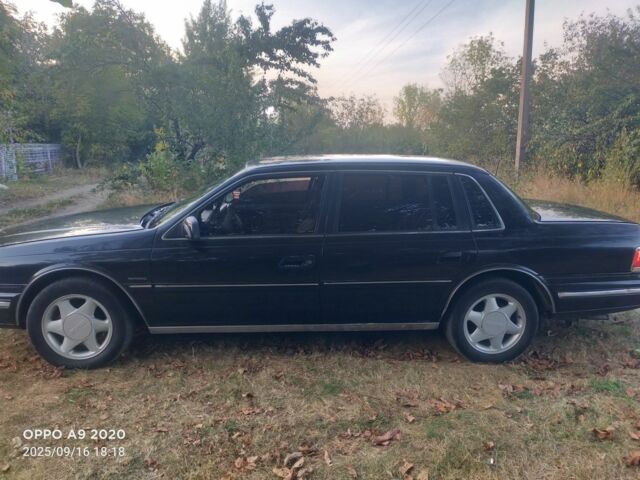 Чорний Лінкольн Континенталь, об'ємом двигуна 3 л та пробігом 2 тис. км за 10000 $, фото 4 на Automoto.ua