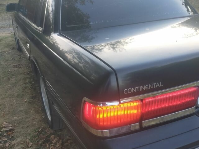 Чорний Лінкольн Континенталь, об'ємом двигуна 3 л та пробігом 2 тис. км за 10000 $, фото 1 на Automoto.ua