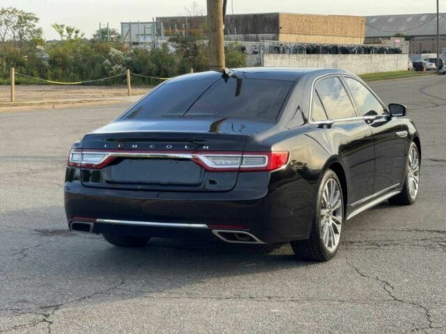 Черный Линкольн Континенталь, объемом двигателя 2.7 л и пробегом 42 тыс. км за 16200 $, фото 5 на Automoto.ua