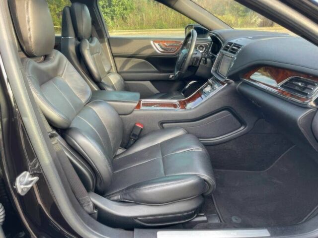 Черный Линкольн Континенталь, объемом двигателя 2.7 л и пробегом 42 тыс. км за 16200 $, фото 9 на Automoto.ua