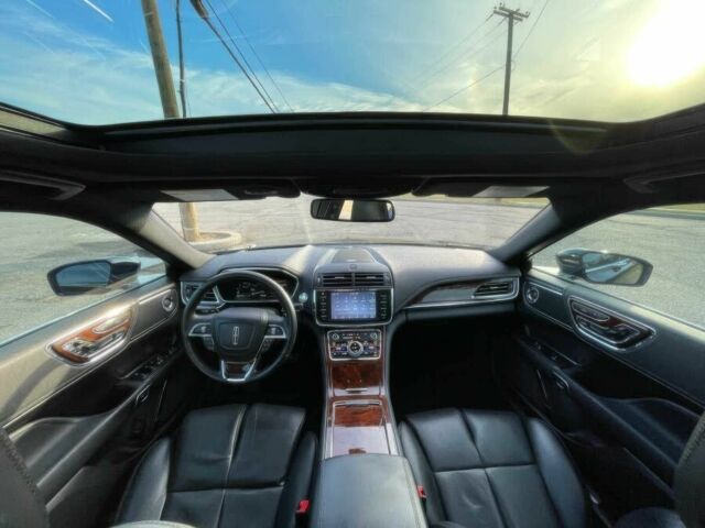 Черный Линкольн Континенталь, объемом двигателя 2.7 л и пробегом 42 тыс. км за 16200 $, фото 8 на Automoto.ua