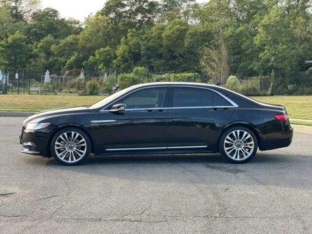 Черный Линкольн Континенталь, объемом двигателя 2.7 л и пробегом 42 тыс. км за 16200 $, фото 7 на Automoto.ua