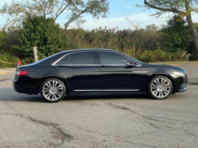 Черный Линкольн Континенталь, объемом двигателя 2.7 л и пробегом 42 тыс. км за 16200 $, фото 4 на Automoto.ua