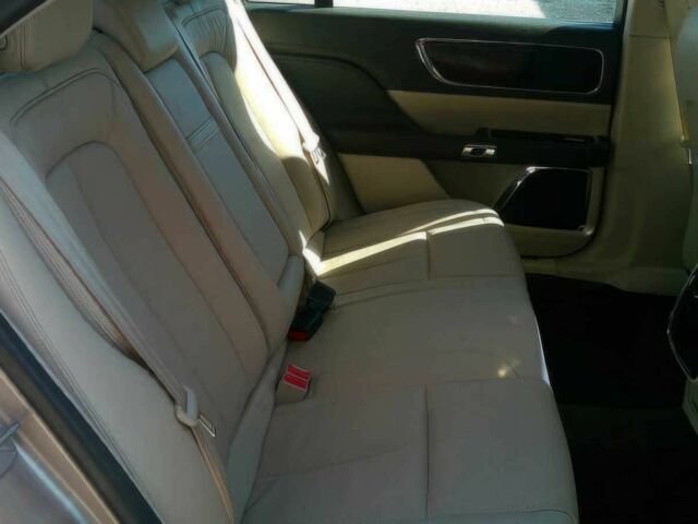 Коричневый Линкольн Континенталь, объемом двигателя 3.7 л и пробегом 49 тыс. км за 19100 $, фото 9 на Automoto.ua