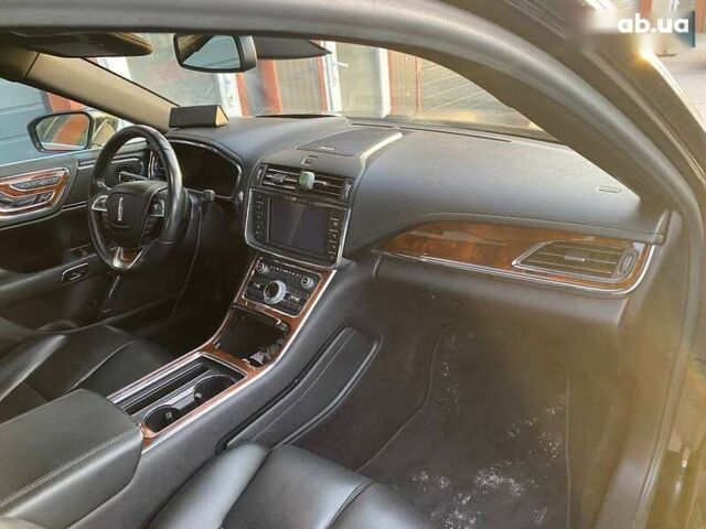 Линкольн Континенталь, объемом двигателя 3 л и пробегом 79 тыс. км за 12800 $, фото 5 на Automoto.ua
