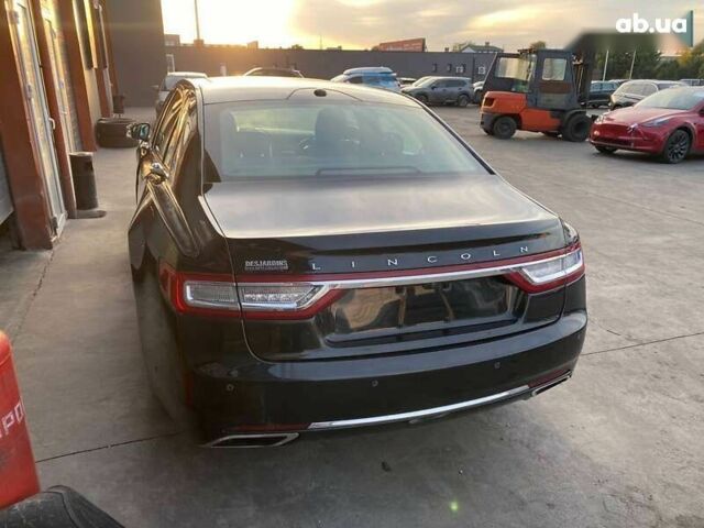 Линкольн Континенталь, объемом двигателя 3 л и пробегом 79 тыс. км за 12800 $, фото 3 на Automoto.ua