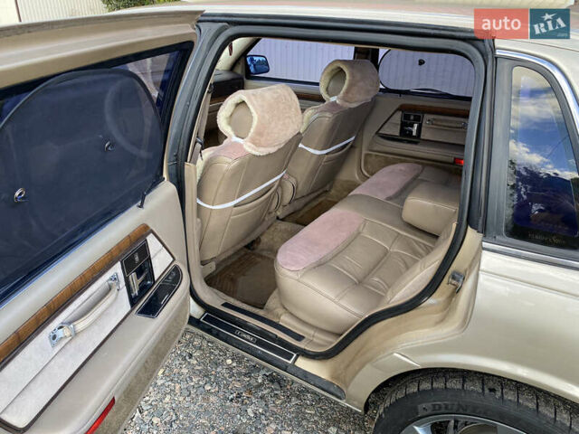 Желтый Линкольн Континенталь, объемом двигателя 3.8 л и пробегом 200 тыс. км за 4500 $, фото 11 на Automoto.ua