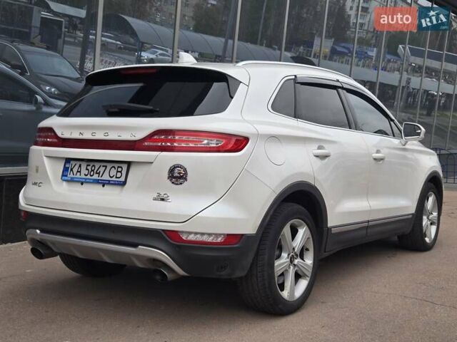 Білий Лінкольн МКС, об'ємом двигуна 2 л та пробігом 170 тис. км за 12500 $, фото 6 на Automoto.ua