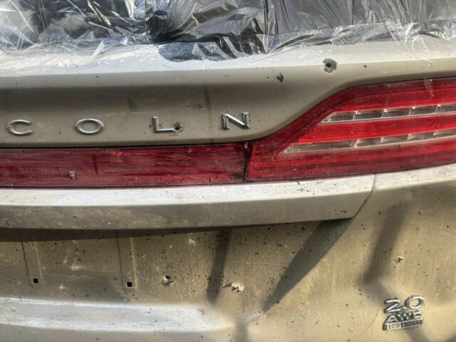 Бежевий Лінкольн МКС, об'ємом двигуна 2 л та пробігом 90 тис. км за 10000 $, фото 6 на Automoto.ua