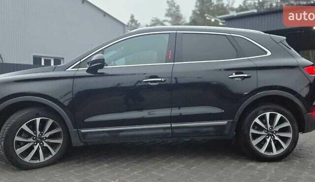 Чорний Лінкольн МКС, об'ємом двигуна 2 л та пробігом 95 тис. км за 20000 $, фото 1 на Automoto.ua