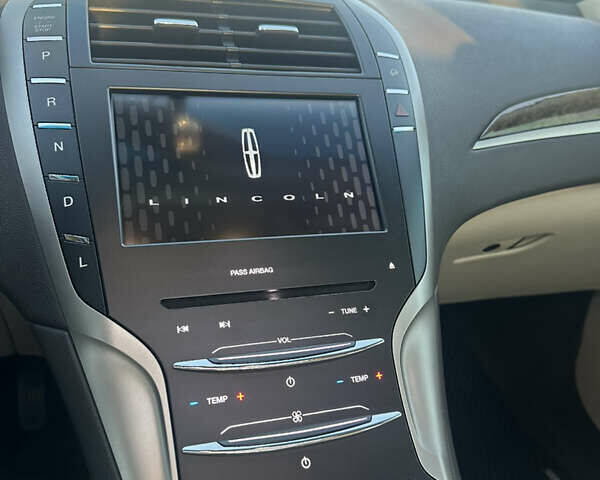 Бежевый Линкольн МКЗ, объемом двигателя 2 л и пробегом 198 тыс. км за 14300 $, фото 20 на Automoto.ua