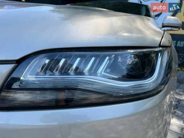 Бежевый Линкольн МКЗ, объемом двигателя 2 л и пробегом 112 тыс. км за 14700 $, фото 2 на Automoto.ua