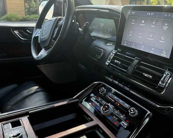 Черный Линкольн Навигатор, объемом двигателя 3.5 л и пробегом 73 тыс. км за 47500 $, фото 22 на Automoto.ua