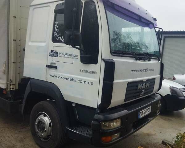 Белый МАН 12.220, объемом двигателя 6.87 л и пробегом 54 тыс. км за 16000 $, фото 2 на Automoto.ua