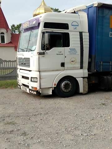 Белый МАН 18.410, объемом двигателя 11.97 л и пробегом 300 тыс. км за 7008 $, фото 1 на Automoto.ua