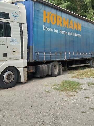 Белый МАН 18.410, объемом двигателя 11.97 л и пробегом 300 тыс. км за 7008 $, фото 6 на Automoto.ua