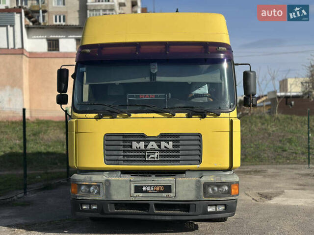Желтый МАН 26.414, объемом двигателя 12 л и пробегом 569 тыс. км за 8500 $, фото 1 на Automoto.ua