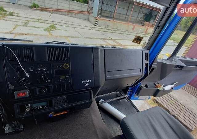 Синий МАН 26.414, объемом двигателя 11.97 л и пробегом 400 тыс. км за 13900 $, фото 3 на Automoto.ua