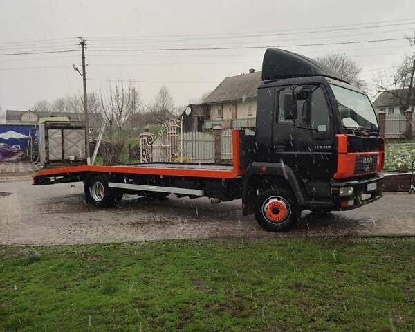 Черный МАН 8.150 груз., объемом двигателя 4.58 л и пробегом 602 тыс. км за 16100 $, фото 2 на Automoto.ua