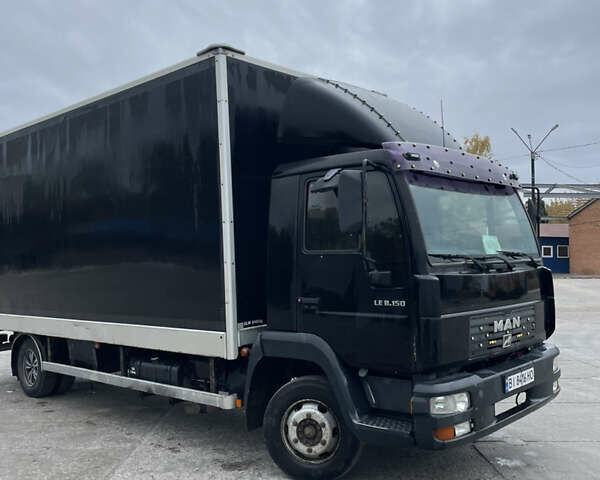 Черный МАН 8.150 груз., объемом двигателя 4.6 л и пробегом 700 тыс. км за 11000 $, фото 1 на Automoto.ua