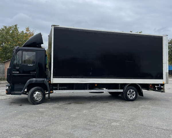 Черный МАН 8.150 груз., объемом двигателя 4.6 л и пробегом 700 тыс. км за 11000 $, фото 4 на Automoto.ua