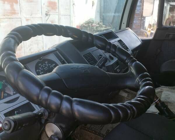 Белый МАН 8.180, объемом двигателя 4.58 л и пробегом 760 тыс. км за 7500 $, фото 2 на Automoto.ua