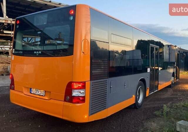 Оранжевый МАН A21, объемом двигателя 12 л и пробегом 700 тыс. км за 15764 $, фото 1 на Automoto.ua