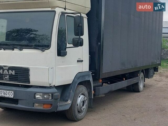 Белый МАН Л 2000, объемом двигателя 6.8 л и пробегом 502 тыс. км за 13700 $, фото 2 на Automoto.ua