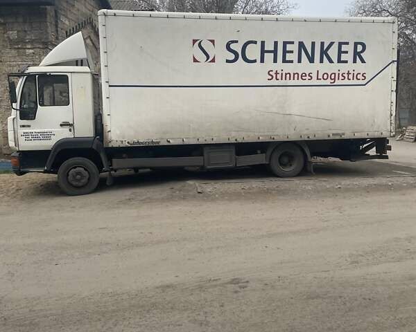 Белый МАН Л 2000, объемом двигателя 4.58 л и пробегом 600 тыс. км за 8000 $, фото 1 на Automoto.ua