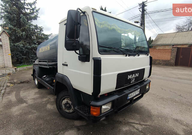 Белый МАН Л 2000, объемом двигателя 4.58 л и пробегом 100 тыс. км за 13500 $, фото 1 на Automoto.ua