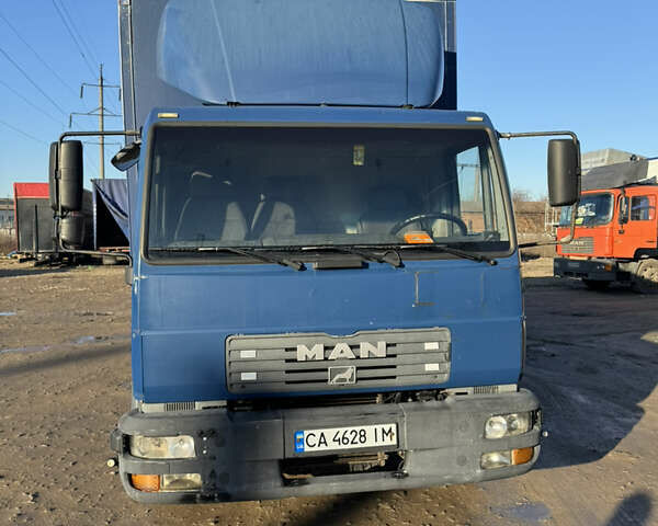 Синій МАН L 2000, об'ємом двигуна 4.58 л та пробігом 600 тис. км за 10500 $, фото 1 на Automoto.ua