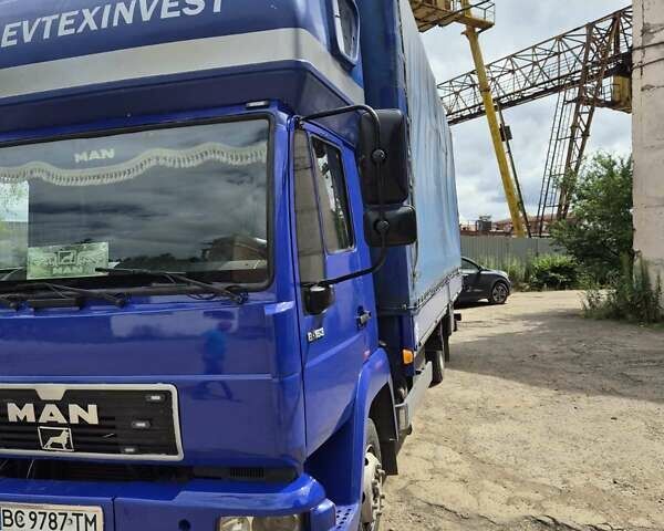 Синий МАН Л 2000, объемом двигателя 4.6 л и пробегом 374 тыс. км за 10500 $, фото 3 на Automoto.ua