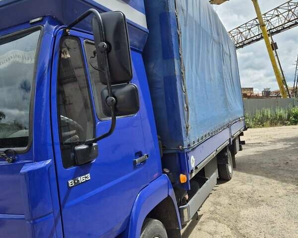 Синий МАН Л 2000, объемом двигателя 4.6 л и пробегом 374 тыс. км за 10500 $, фото 2 на Automoto.ua