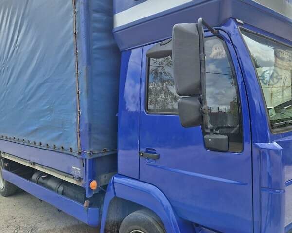 Синий МАН Л 2000, объемом двигателя 4.6 л и пробегом 374 тыс. км за 10500 $, фото 4 на Automoto.ua