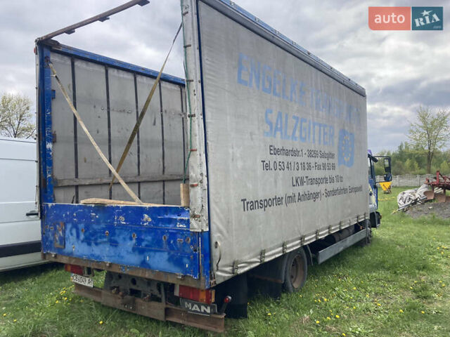 Синій МАН L 2000, об'ємом двигуна 4.58 л та пробігом 397 тис. км за 9400 $, фото 1 на Automoto.ua