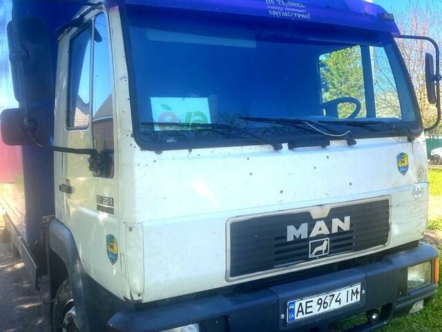 Белый МАН Л, объемом двигателя 6.8 л и пробегом 850 тыс. км за 8400 $, фото 2 на Automoto.ua