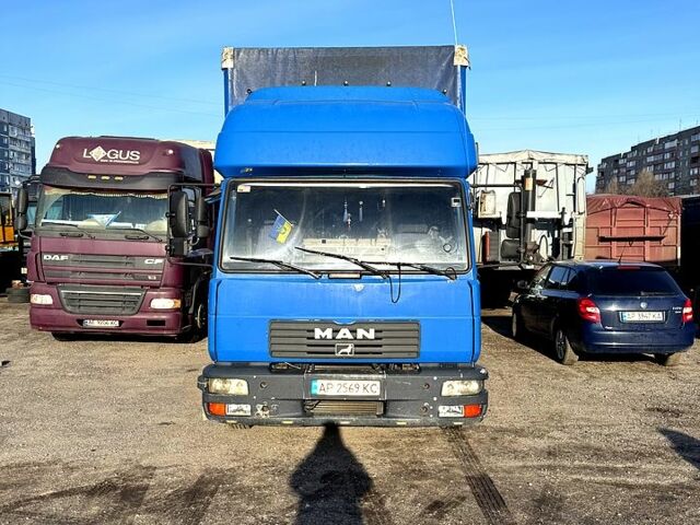 Синий МАН Л, объемом двигателя 6.9 л и пробегом 581 тыс. км за 14000 $, фото 2 на Automoto.ua