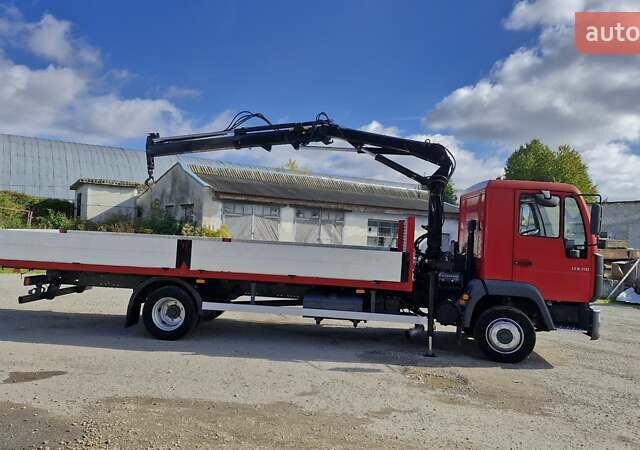 Красный МАН ЛЕ 150, объемом двигателя 4.3 л и пробегом 451 тыс. км за 22950 $, фото 1 на Automoto.ua