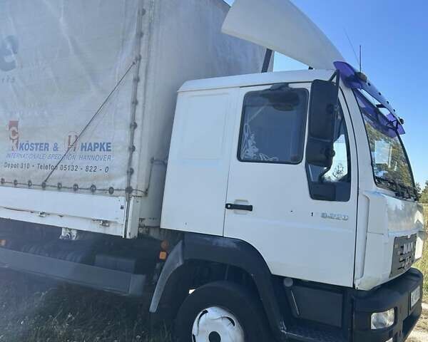 Белый МАН ЛЕ 8.220, объемом двигателя 6.87 л и пробегом 735 тыс. км за 14500 $, фото 1 на Automoto.ua