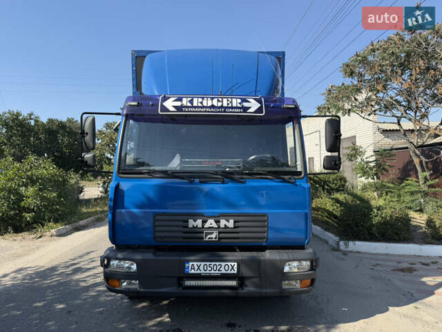 Синій МАН ЛЕ 8.220, об'ємом двигуна 6.87 л та пробігом 404 тис. км за 19300 $, фото 1 на Automoto.ua