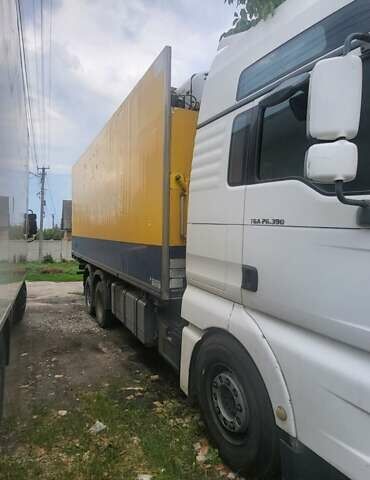 Белый МАН ТГА, объемом двигателя 10.52 л и пробегом 950 тыс. км за 25000 $, фото 2 на Automoto.ua