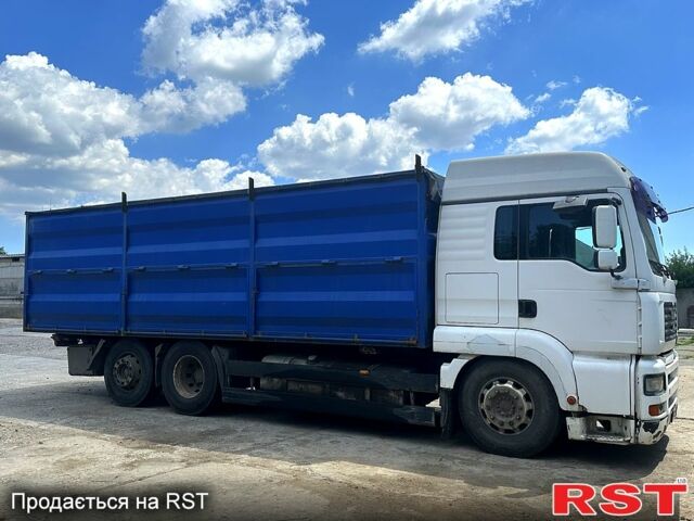 Белый МАН ТГА, объемом двигателя 10.9 л и пробегом 850 тыс. км за 12000 $, фото 1 на Automoto.ua