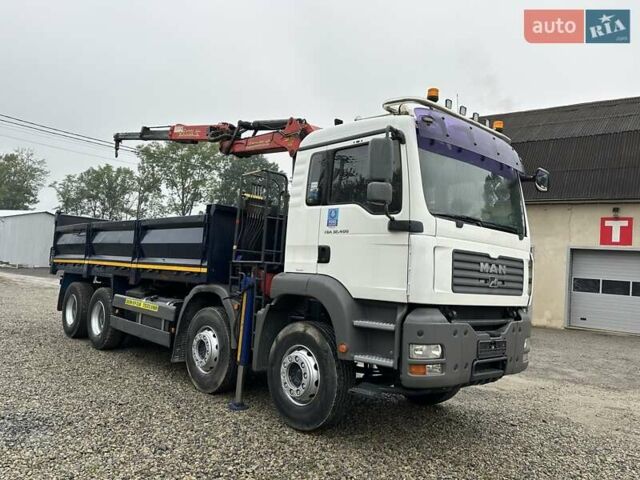 Белый МАН ТГА, объемом двигателя 12.4 л и пробегом 408 тыс. км за 77500 $, фото 1 на Automoto.ua