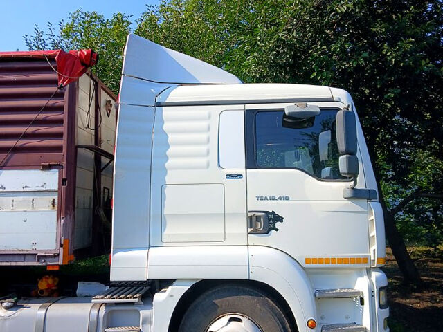 Белый МАН ТГА, объемом двигателя 12 л и пробегом 120 тыс. км за 10000 $, фото 3 на Automoto.ua