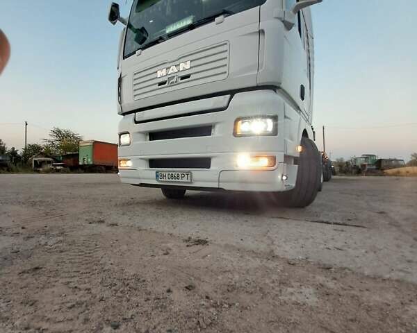 Белый МАН ТГА, объемом двигателя 10.52 л и пробегом 480 тыс. км за 18000 $, фото 2 на Automoto.ua