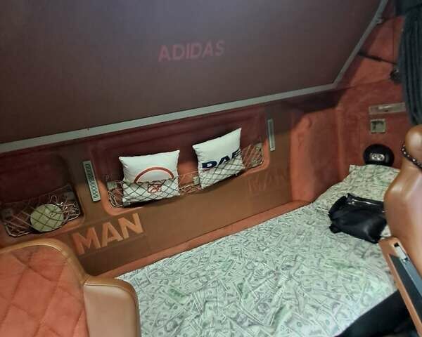 Белый МАН ТГА, объемом двигателя 10.52 л и пробегом 480 тыс. км за 18000 $, фото 18 на Automoto.ua