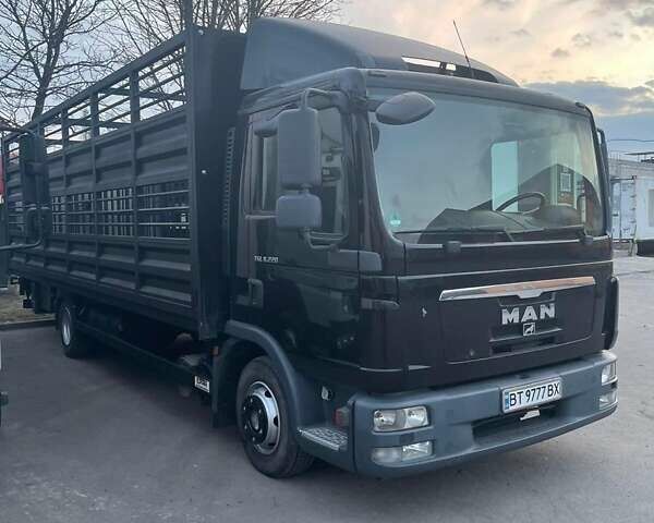 Черный МАН ТГА, объемом двигателя 4.58 л и пробегом 425 тыс. км за 30000 $, фото 3 на Automoto.ua