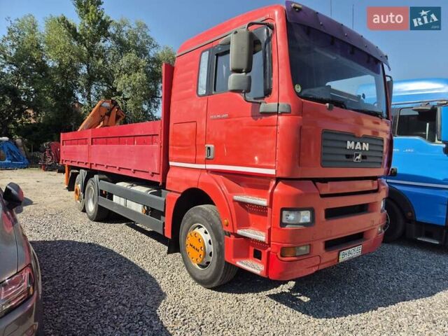Красный МАН ТГА, объемом двигателя 11.97 л и пробегом 998 тыс. км за 27500 $, фото 1 на Automoto.ua